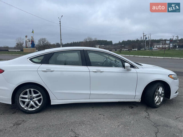 Белый Форд Фьюжн, объемом двигателя 1.6 л и пробегом 290 тыс. км за 8500 $, фото 7 на Automoto.ua