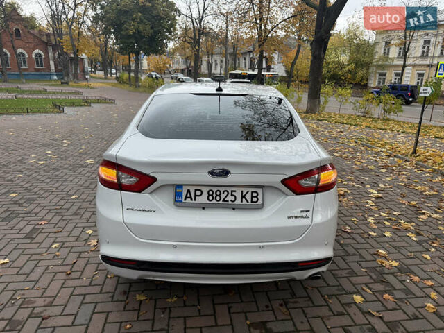 Білий Форд Фьюжен, об'ємом двигуна 2 л та пробігом 210 тис. км за 10699 $, фото 5 на Automoto.ua