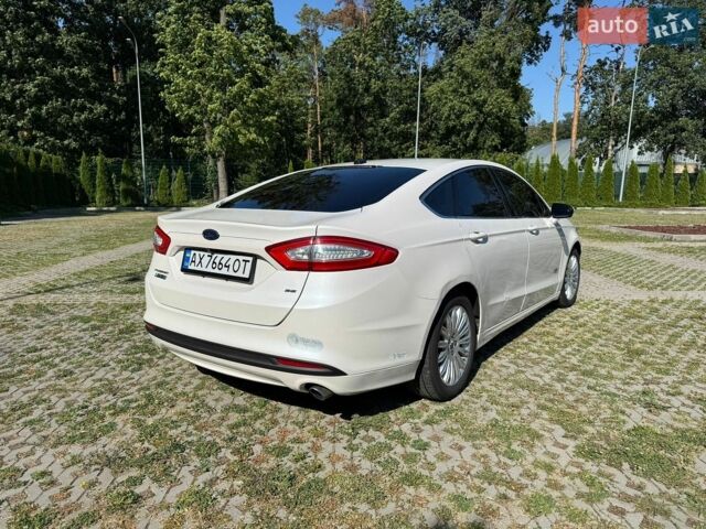 Білий Форд Фьюжен, об'ємом двигуна 2 л та пробігом 269 тис. км за 9300 $, фото 10 на Automoto.ua