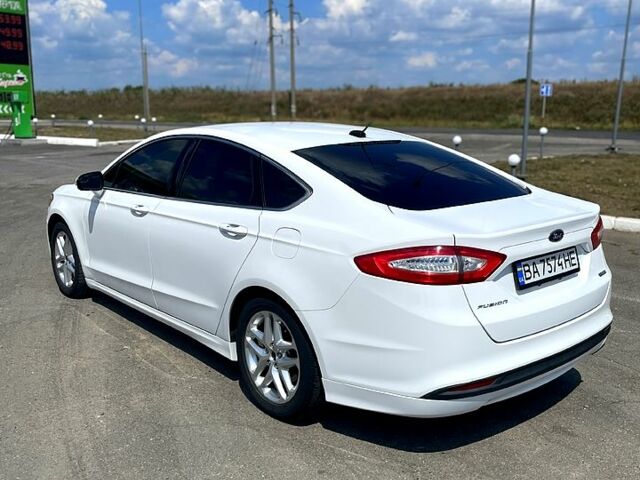 Белый Форд Фьюжн, объемом двигателя 1.6 л и пробегом 160 тыс. км за 9500 $, фото 6 на Automoto.ua