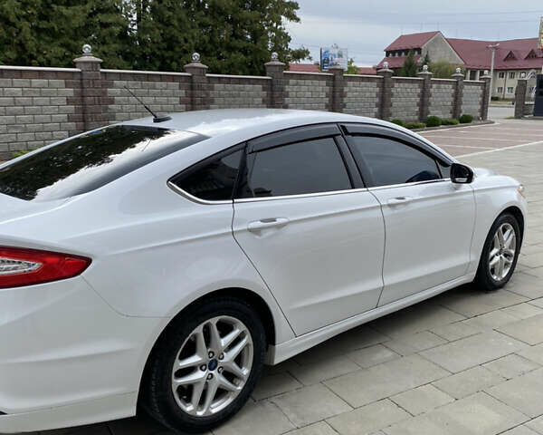 Білий Форд Фьюжен, об'ємом двигуна 2.5 л та пробігом 209 тис. км за 8700 $, фото 5 на Automoto.ua
