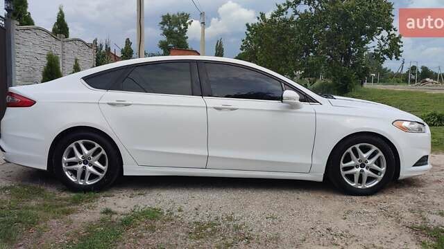 Білий Форд Фьюжен, об'ємом двигуна 2.5 л та пробігом 197 тис. км за 10200 $, фото 3 на Automoto.ua