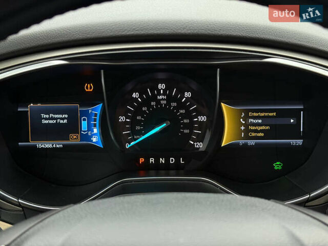 Білий Форд Фьюжен, об'ємом двигуна 2 л та пробігом 153 тис. км за 9500 $, фото 28 на Automoto.ua