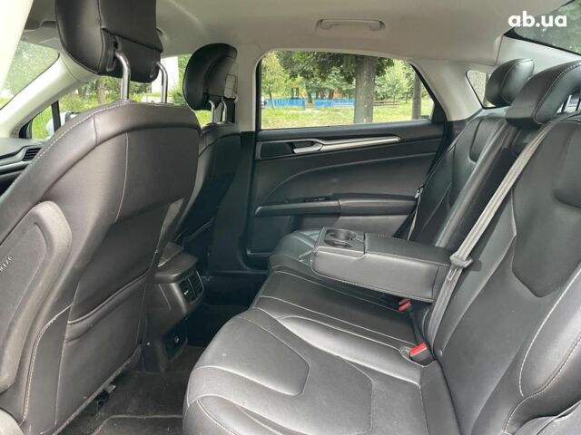 Белый Форд Фьюжн, объемом двигателя 2 л и пробегом 245 тыс. км за 9790 $, фото 19 на Automoto.ua