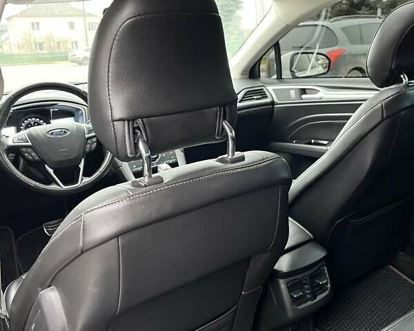 Белый Форд Фьюжн, объемом двигателя 2 л и пробегом 137 тыс. км за 11000 $, фото 31 на Automoto.ua