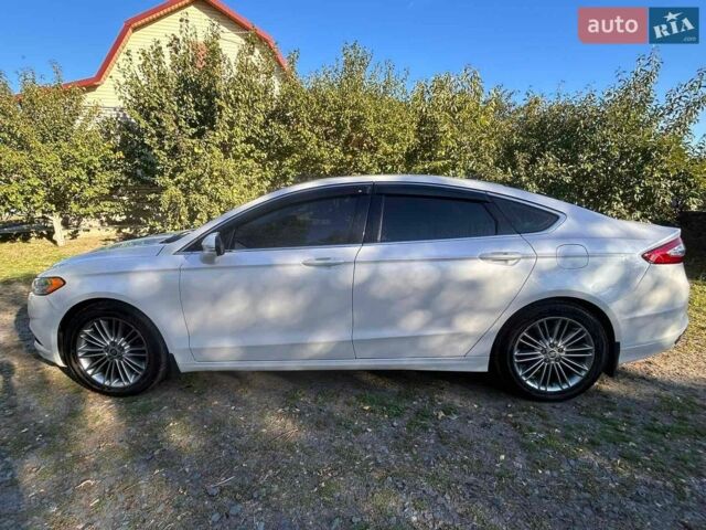 Белый Форд Фьюжн, объемом двигателя 2 л и пробегом 250 тыс. км за 9800 $, фото 2 на Automoto.ua
