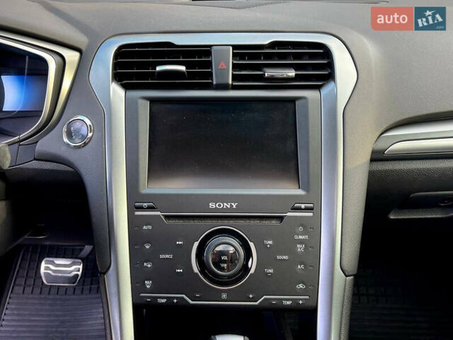 Білий Форд Фьюжен, об'ємом двигуна 2 л та пробігом 160 тис. км за 12000 $, фото 5 на Automoto.ua