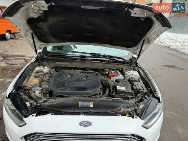 Білий Форд Фьюжен, об'ємом двигуна 2 л та пробігом 198 тис. км за 7500 $, фото 19 на Automoto.ua