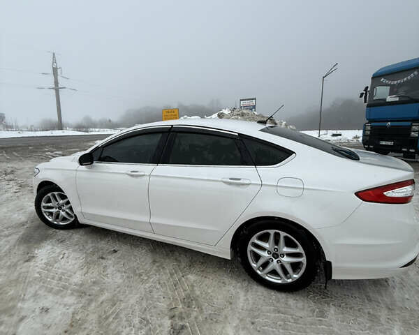 Білий Форд Фьюжен, об'ємом двигуна 1.5 л та пробігом 208 тис. км за 9666 $, фото 19 на Automoto.ua