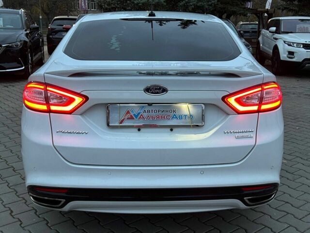 Білий Форд Фьюжен, об'ємом двигуна 2 л та пробігом 183 тис. км за 10500 $, фото 5 на Automoto.ua