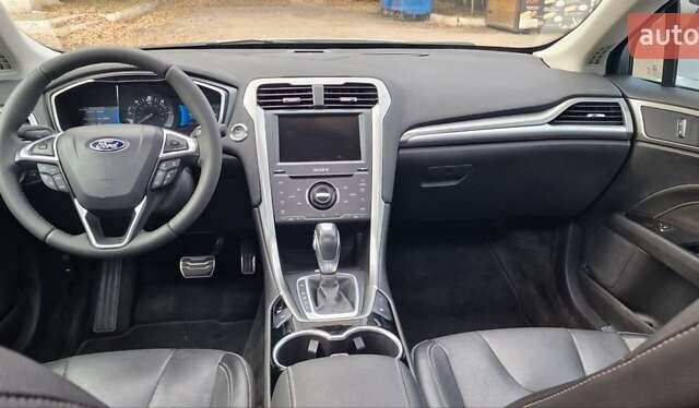 Білий Форд Фьюжен, об'ємом двигуна 2 л та пробігом 130 тис. км за 14900 $, фото 27 на Automoto.ua