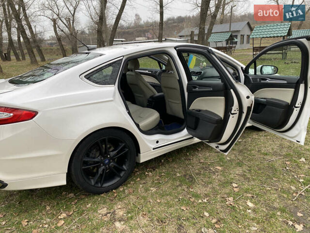 Белый Форд Фьюжн, объемом двигателя 2 л и пробегом 400 тыс. км за 9200 $, фото 10 на Automoto.ua