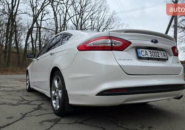 Білий Форд Фьюжен, об'ємом двигуна 2.5 л та пробігом 240 тис. км за 9449 $, фото 11 на Automoto.ua