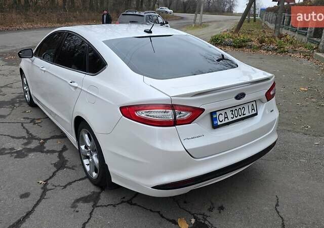 Білий Форд Фьюжен, об'ємом двигуна 2.49 л та пробігом 241 тис. км за 9400 $, фото 9 на Automoto.ua