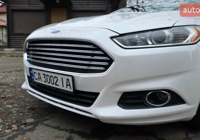 Білий Форд Фьюжен, об'ємом двигуна 2.5 л та пробігом 240 тис. км за 9449 $, фото 29 на Automoto.ua