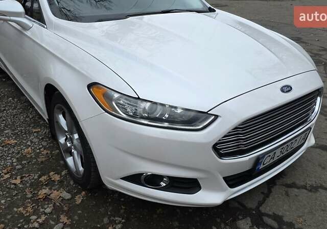 Білий Форд Фьюжен, об'ємом двигуна 2.5 л та пробігом 240 тис. км за 9449 $, фото 26 на Automoto.ua