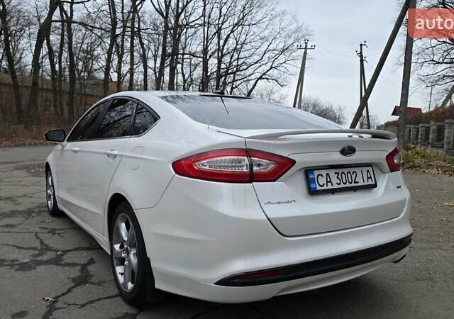 Білий Форд Фьюжен, об'ємом двигуна 2.5 л та пробігом 240 тис. км за 9449 $, фото 10 на Automoto.ua