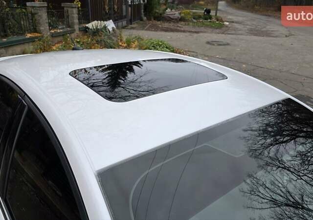 Білий Форд Фьюжен, об'ємом двигуна 2.5 л та пробігом 240 тис. км за 9449 $, фото 33 на Automoto.ua