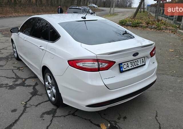 Білий Форд Фьюжен, об'ємом двигуна 2.5 л та пробігом 240 тис. км за 9449 $, фото 9 на Automoto.ua