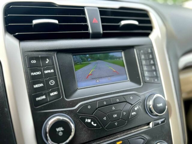 Білий Форд Фьюжен, об'ємом двигуна 2 л та пробігом 137 тис. км за 1800 $, фото 21 на Automoto.ua
