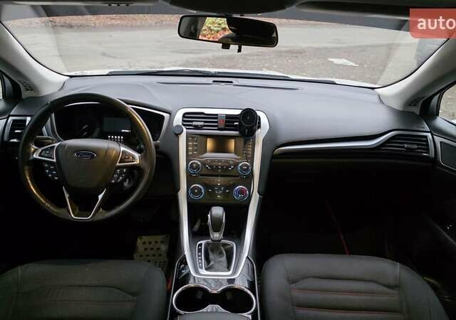 Білий Форд Фьюжен, об'ємом двигуна 2.5 л та пробігом 240 тис. км за 9449 $, фото 36 на Automoto.ua