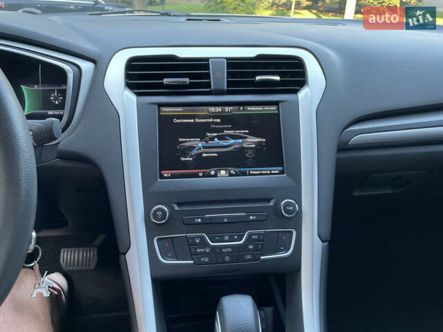 Білий Форд Фьюжен, об'ємом двигуна 2 л та пробігом 169 тис. км за 13000 $, фото 13 на Automoto.ua