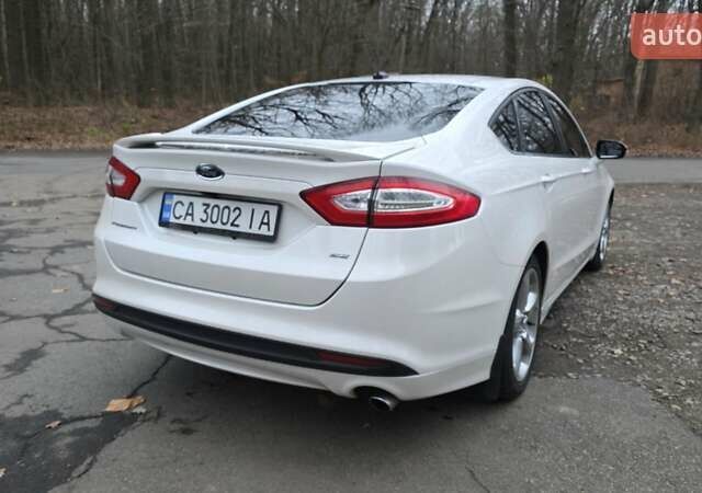 Білий Форд Фьюжен, об'ємом двигуна 2.5 л та пробігом 240 тис. км за 9449 $, фото 14 на Automoto.ua