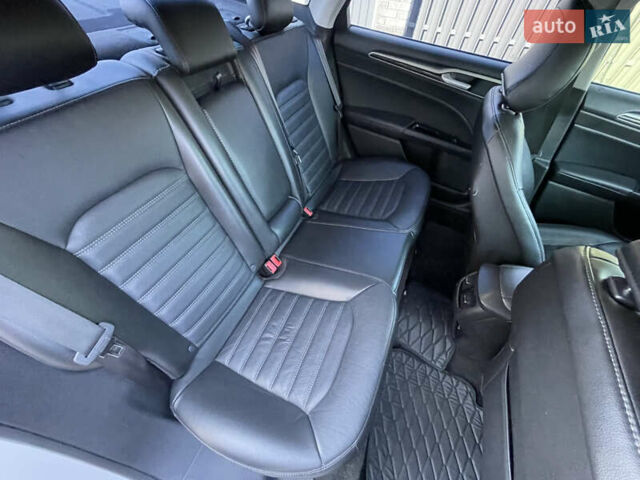 Білий Форд Фьюжен, об'ємом двигуна 2 л та пробігом 180 тис. км за 11400 $, фото 21 на Automoto.ua