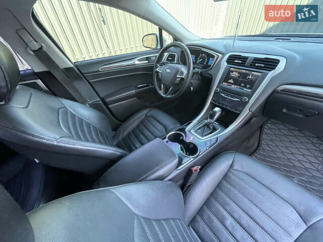 Білий Форд Фьюжен, об'ємом двигуна 2 л та пробігом 180 тис. км за 11400 $, фото 24 на Automoto.ua