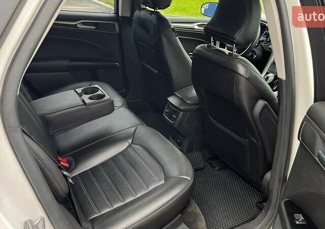 Білий Форд Фьюжен, об'ємом двигуна 2 л та пробігом 176 тис. км за 12500 $, фото 13 на Automoto.ua