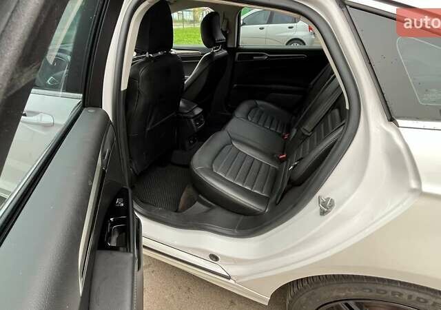 Білий Форд Фьюжен, об'ємом двигуна 2 л та пробігом 176 тис. км за 12500 $, фото 11 на Automoto.ua