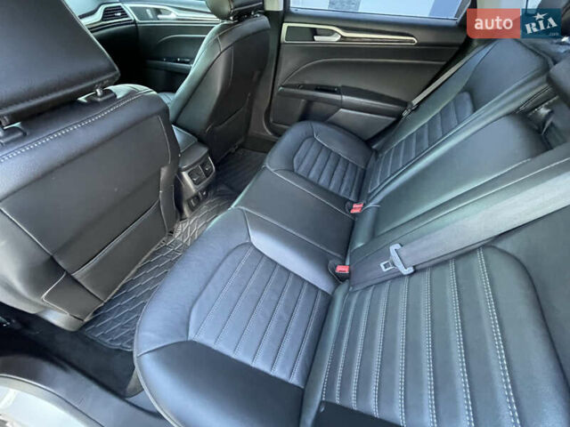 Білий Форд Фьюжен, об'ємом двигуна 2 л та пробігом 180 тис. км за 11400 $, фото 17 на Automoto.ua