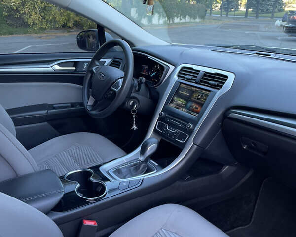 Білий Форд Фьюжен, об'ємом двигуна 2 л та пробігом 169 тис. км за 13000 $, фото 3 на Automoto.ua