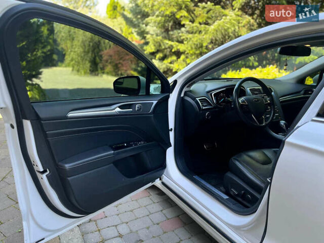Білий Форд Фьюжен, об'ємом двигуна 2 л та пробігом 177 тис. км за 11995 $, фото 15 на Automoto.ua