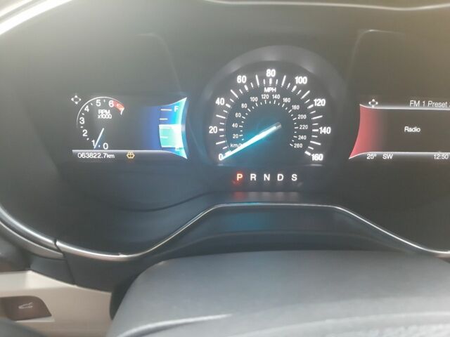 Белый Форд Фьюжн, объемом двигателя 2.5 л и пробегом 77 тыс. км за 13000 $, фото 5 на Automoto.ua