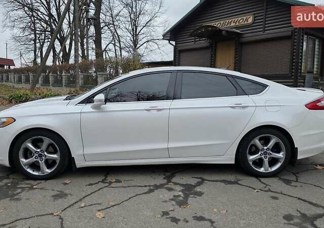 Білий Форд Фьюжен, об'ємом двигуна 2.5 л та пробігом 240 тис. км за 9449 $, фото 6 на Automoto.ua