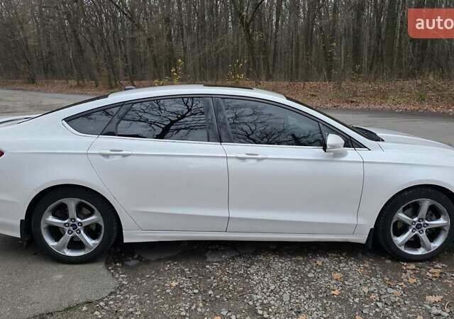 Білий Форд Фьюжен, об'ємом двигуна 2.5 л та пробігом 240 тис. км за 9449 $, фото 23 на Automoto.ua