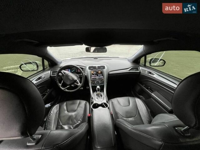 Білий Форд Фьюжен, об'ємом двигуна 2 л та пробігом 203 тис. км за 11000 $, фото 36 на Automoto.ua