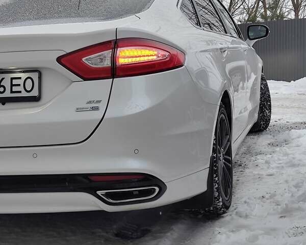 Белый Форд Фьюжн, объемом двигателя 2 л и пробегом 141 тыс. км за 9800 $, фото 5 на Automoto.ua