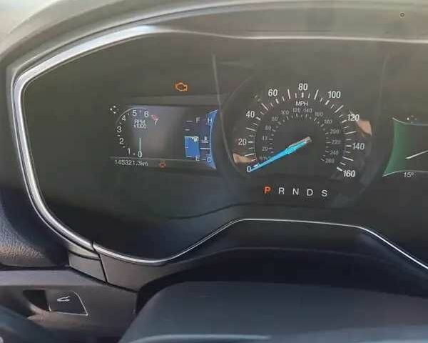Білий Форд Фьюжен, об'ємом двигуна 2 л та пробігом 145 тис. км за 11700 $, фото 6 на Automoto.ua