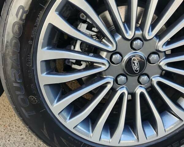 Белый Форд Фьюжн, объемом двигателя 2 л и пробегом 215 тыс. км за 10550 $, фото 7 на Automoto.ua