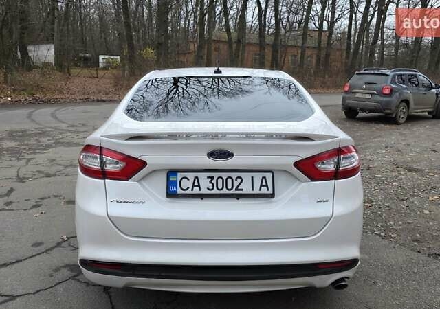 Білий Форд Фьюжен, об'ємом двигуна 2.5 л та пробігом 240 тис. км за 9449 $, фото 12 на Automoto.ua
