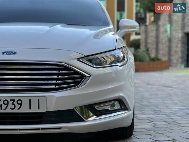 Білий Форд Фьюжен, об'ємом двигуна 2 л та пробігом 128 тис. км за 19000 $, фото 16 на Automoto.ua