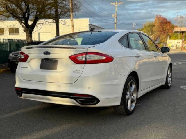 Білий Форд Фьюжен, об'ємом двигуна 2 л та пробігом 77 тис. км за 6200 $, фото 7 на Automoto.ua