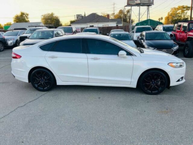 Білий Форд Фьюжен, об'ємом двигуна 2 л та пробігом 78 тис. км за 8800 $, фото 3 на Automoto.ua