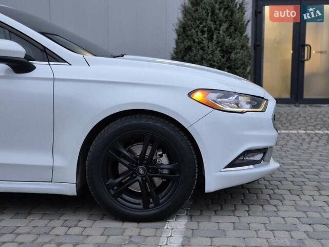 Белый Форд Фьюжн, объемом двигателя 2.49 л и пробегом 204 тыс. км за 12999 $, фото 5 на Automoto.ua