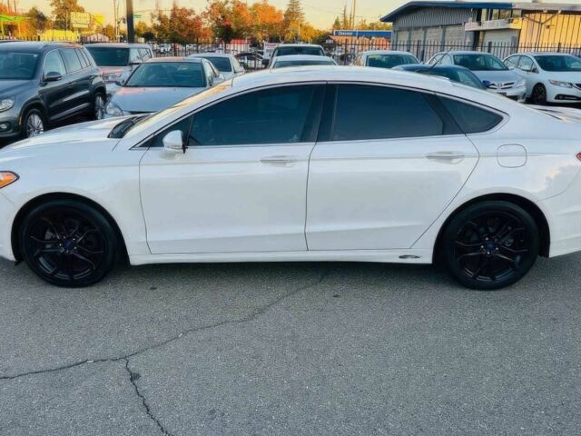 Білий Форд Фьюжен, об'ємом двигуна 2 л та пробігом 78 тис. км за 8800 $, фото 4 на Automoto.ua