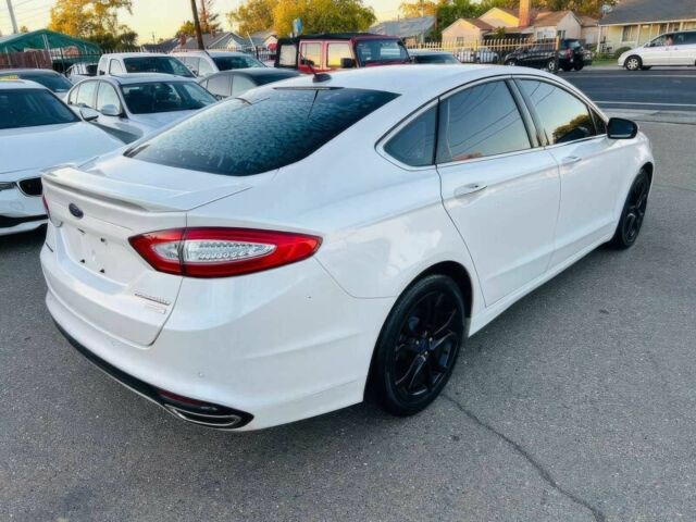 Білий Форд Фьюжен, об'ємом двигуна 2 л та пробігом 78 тис. км за 8800 $, фото 5 на Automoto.ua