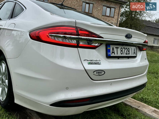 Білий Форд Фьюжен, об'ємом двигуна 2 л та пробігом 259 тис. км за 12499 $, фото 31 на Automoto.ua