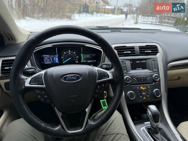 Білий Форд Фьюжен, об'ємом двигуна 2 л та пробігом 352 тис. км за 9800 $, фото 24 на Automoto.ua